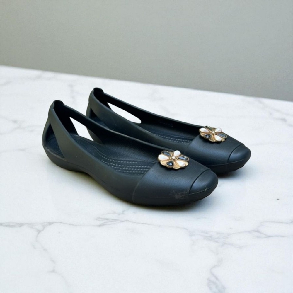 CROCS Black Women's Flats with Gold Flower Accent